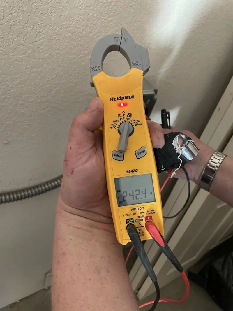 Voltage testing with clamp meter during Hot Tub / Pool Electrical Wiring in Lincoln
